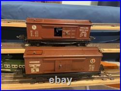 (2) Different Variations Prewar Lionel 3814 Operating Merchandise Boxcar
