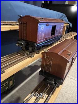 (2) Different Variations Prewar Lionel 3814 Operating Merchandise Boxcar