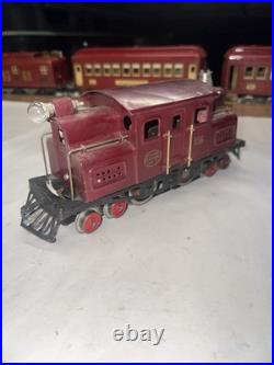 LIONEL Prewar O Gauge 156 engine dark red. Restored runs good