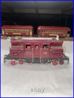 LIONEL Prewar O Gauge 156 engine dark red. Restored runs good