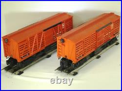 LOT OF 2 POST-WAR LIONEL No. 3656 OPERATING CATTLE CARS & CORRALS (1952-53)