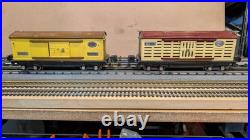 Lionel Pre-War Freight Cars #813 cream and Maroon and #814 Automobile Car