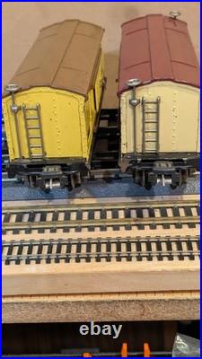 Lionel Pre-War Freight Cars #813 cream and Maroon and #814 Automobile Car