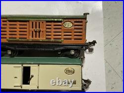 Lionel Pre-war O Gauge 4 freight cars cattle, refrig, gondola & box. Lot 2