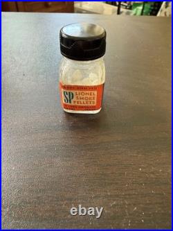 Lionel Vintage smoked pills pre-war bottle with someone in it? S Lionel Vintage smoked pills pre-war bottle with someone in it? S