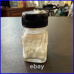 Lionel Vintage smoked pills pre-war bottle with someone in it? S