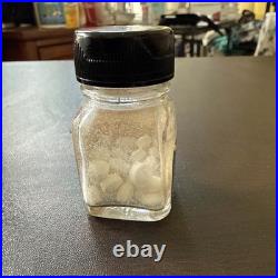 Lionel Vintage smoked pills pre-war bottle with someone in it? S