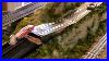 O_Scale_Trains_And_Slot_Cars_With_An_Optional_Jump_Ground_Cover_Ballast_And_Scenery_Added_01_wwya