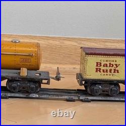 Prewar tin Lionel train Shell Tanker, Baby Ruth, track withswitchback, rr crossing