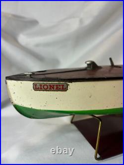 Working Pre War Lionel Craft Wind Up Motorboat With Passengers & Stand Working Pre War Lionel Craft Wind Up Motorboat With Passengers & Stand